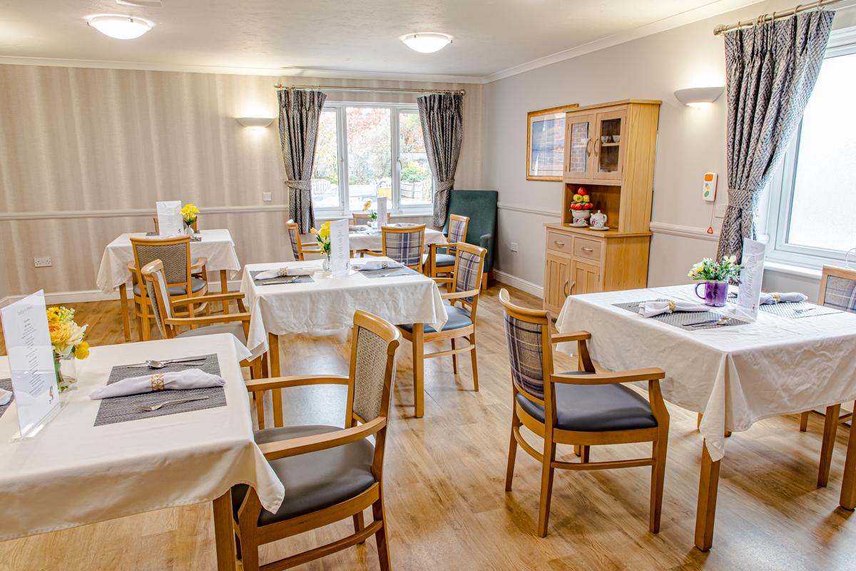 dining area with tables and chairs